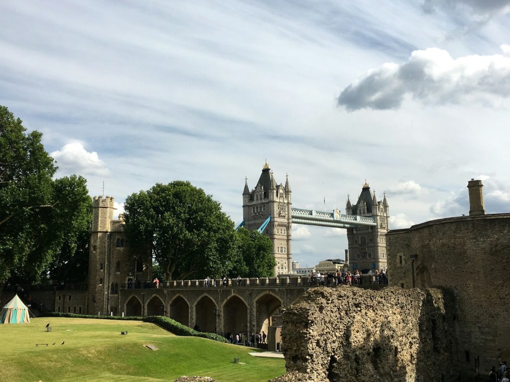 a castle with a bridge in the background