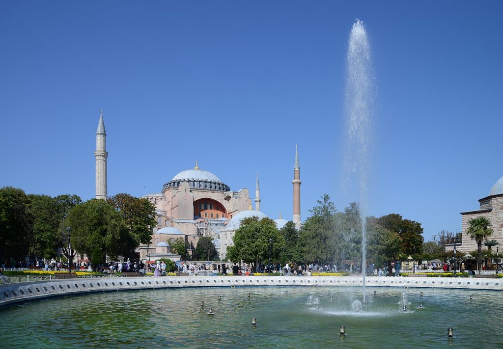 The exterior of Hagia Sophia with its central dome, buttresses and four minarets