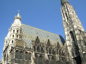 St Stephen's Cathedral seen from the square, its patterned tiled roof and south tower rising above the surrounding buildings