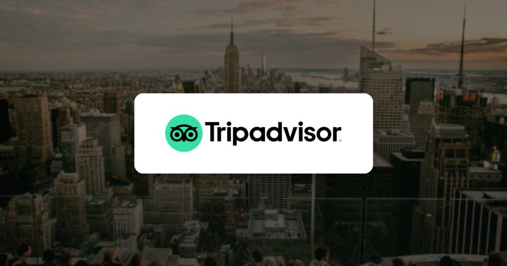 Tripadvisor logo over a city skyline viewpoint