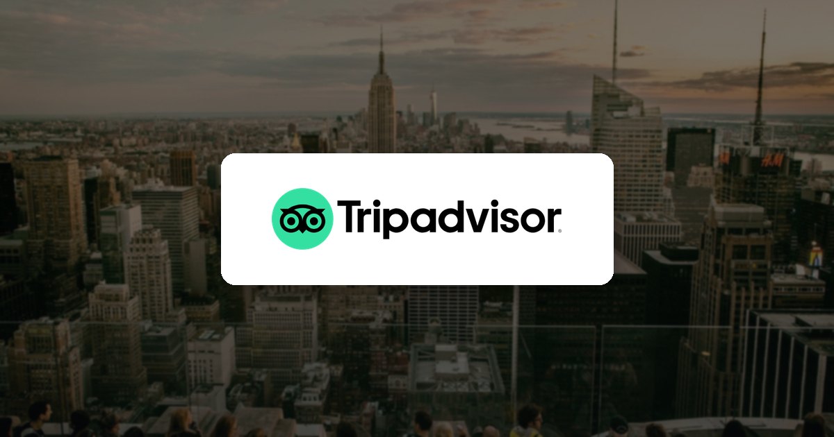 Tripadvisor logo over a city skyline viewpoint